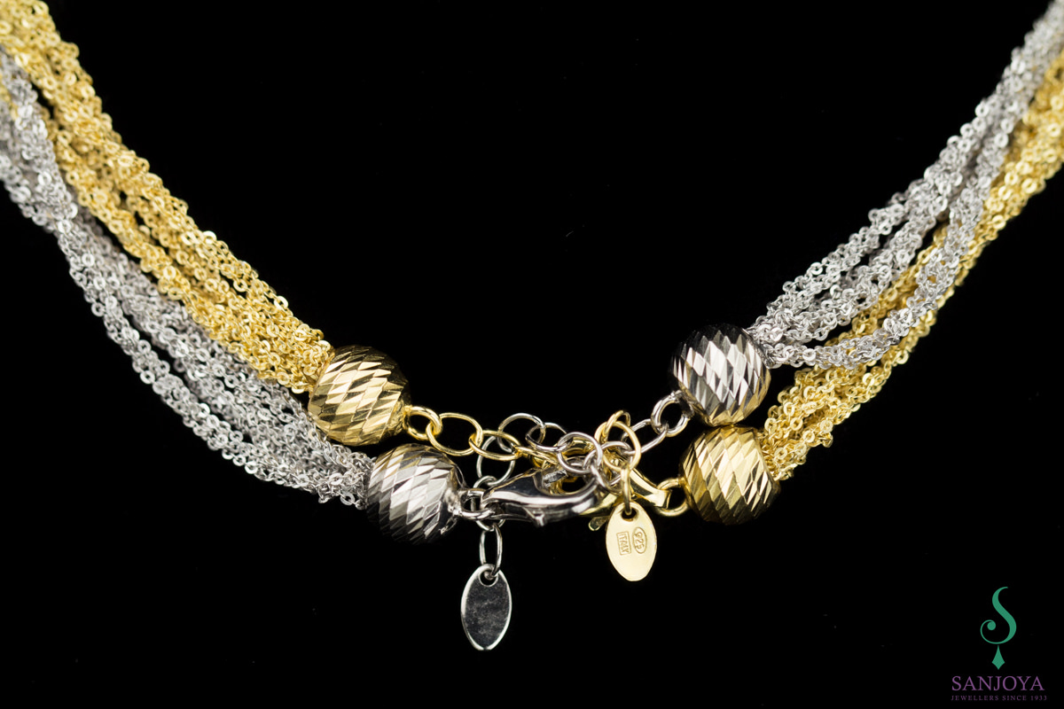 Four interwoven chains of gold plated silver