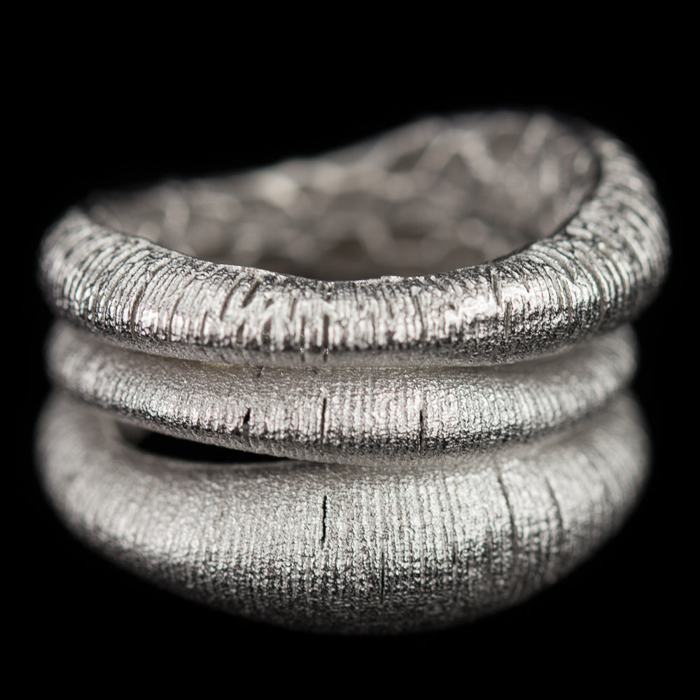 Wide three row silver ring