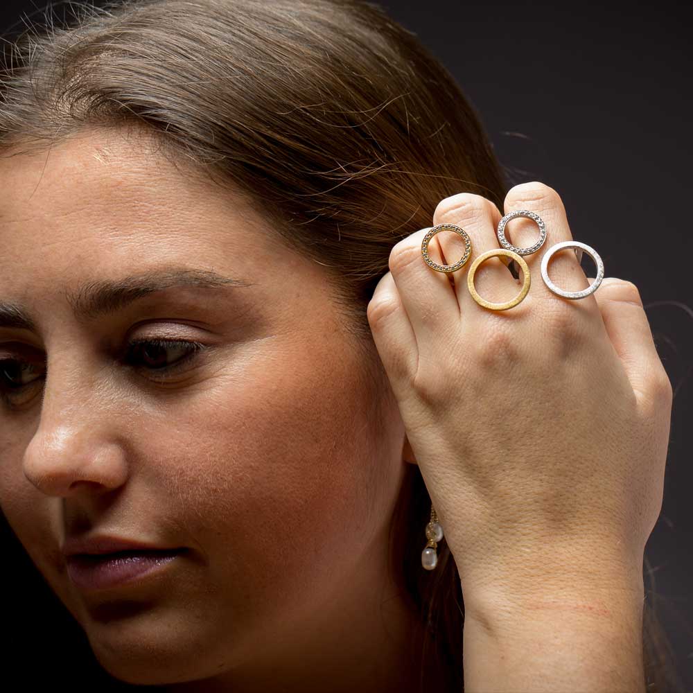 Large silver ring with a small and large circle