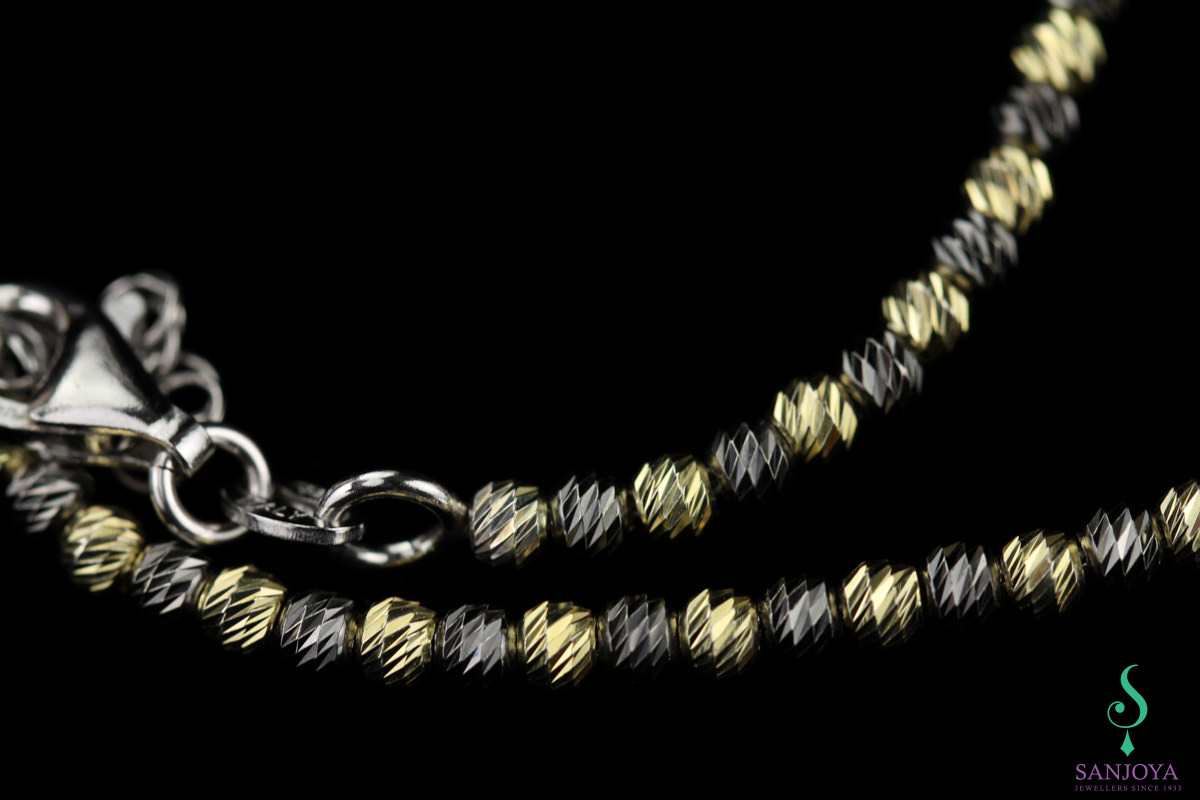 Italian two-tone gold bracelet, varying thicknesses