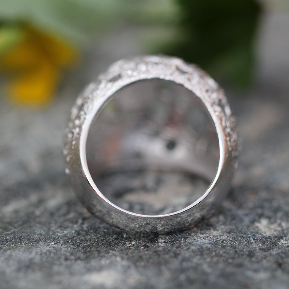 Processed and silver spherical ring