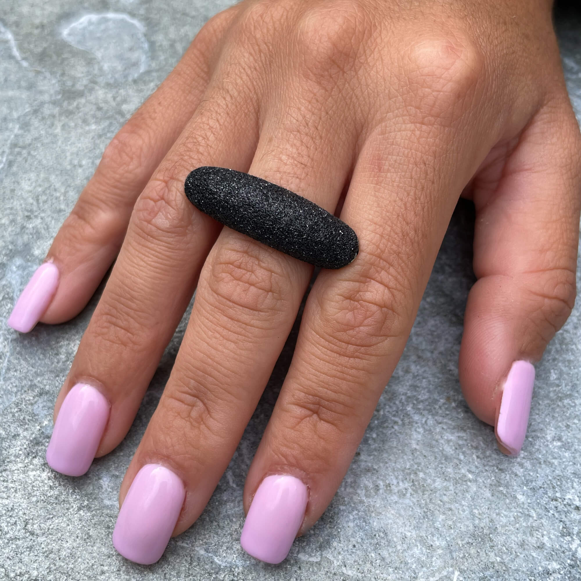 Beautiful and elongated black ring made of silver