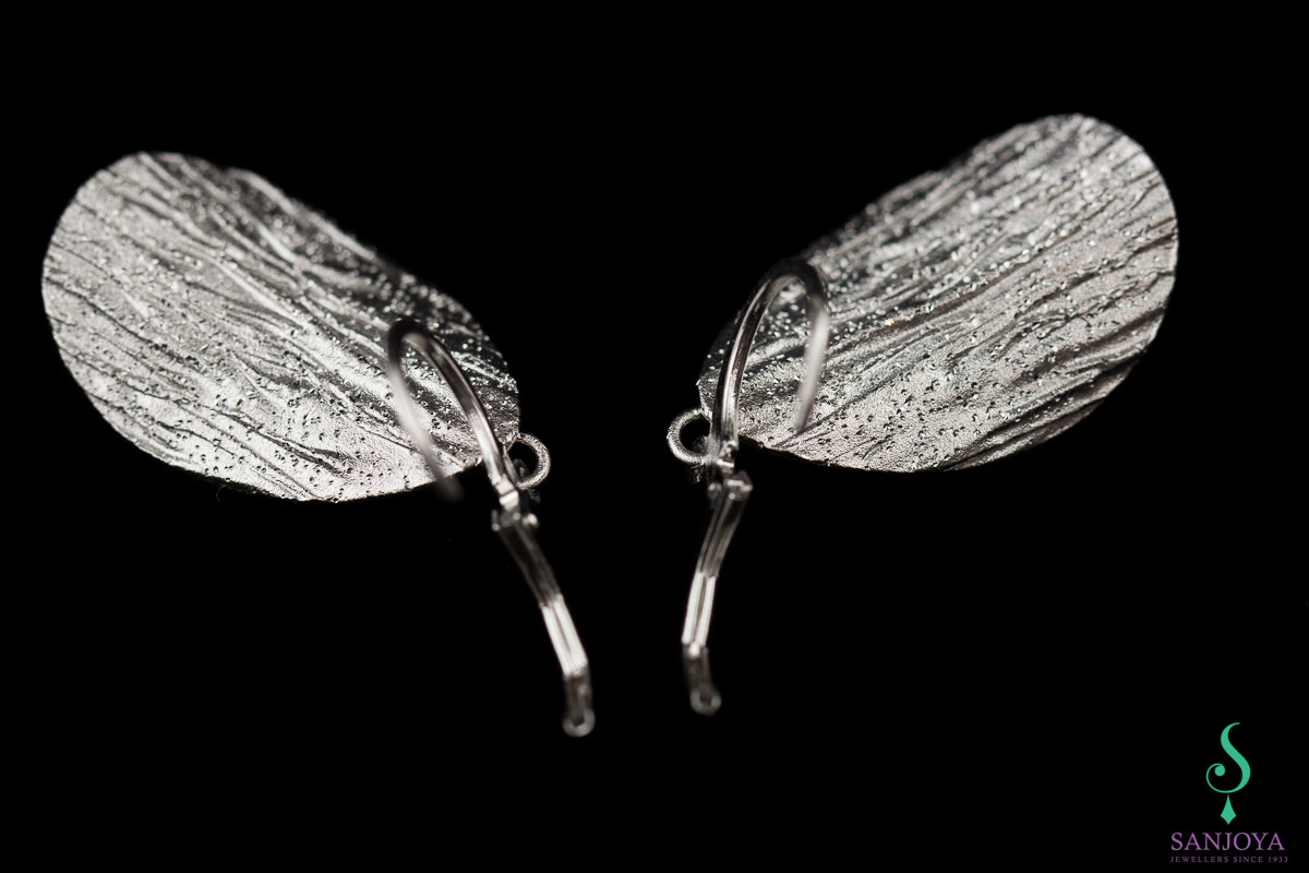 Silver dependent and oval diamanted earrings