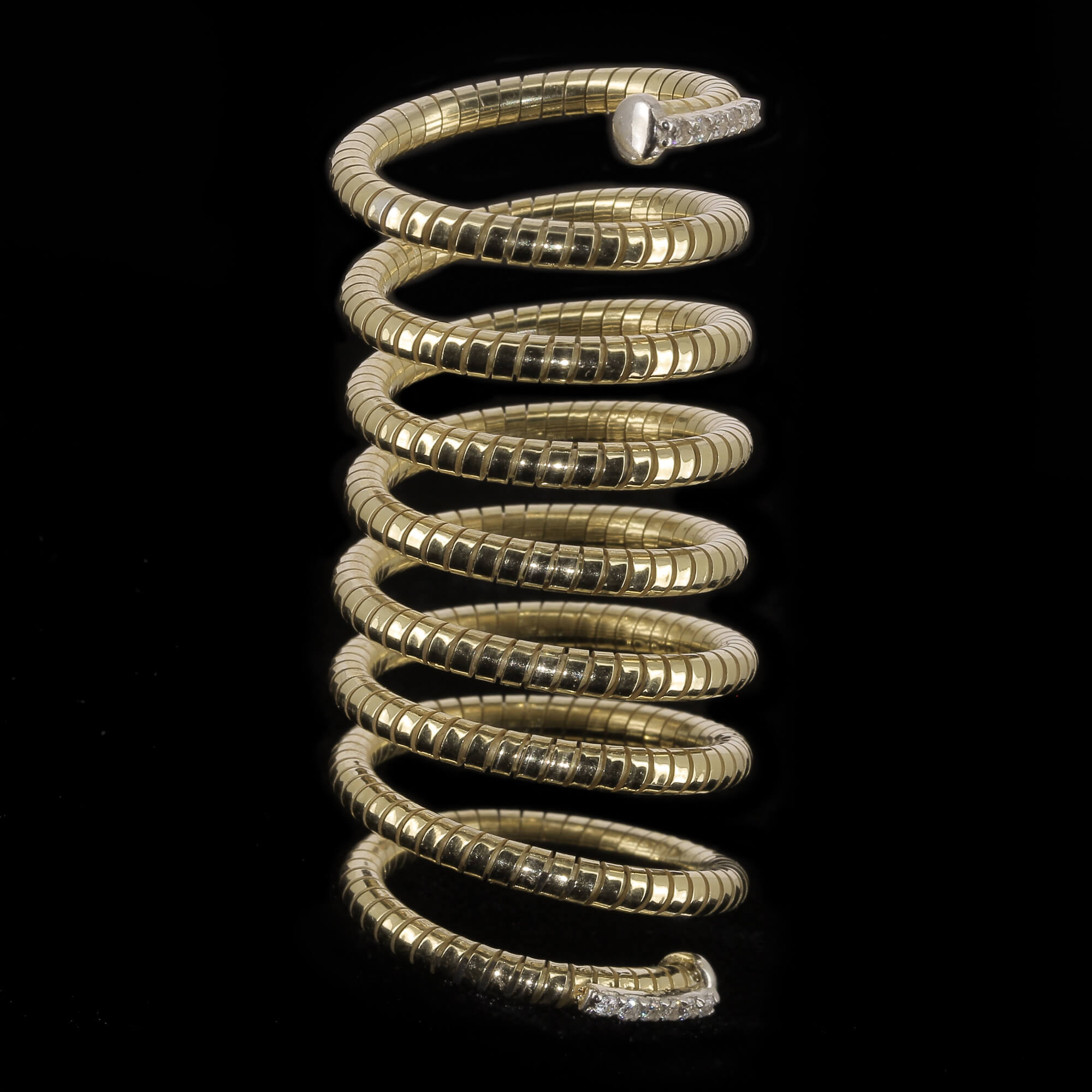 Gold plated and spiral ring with zirconia