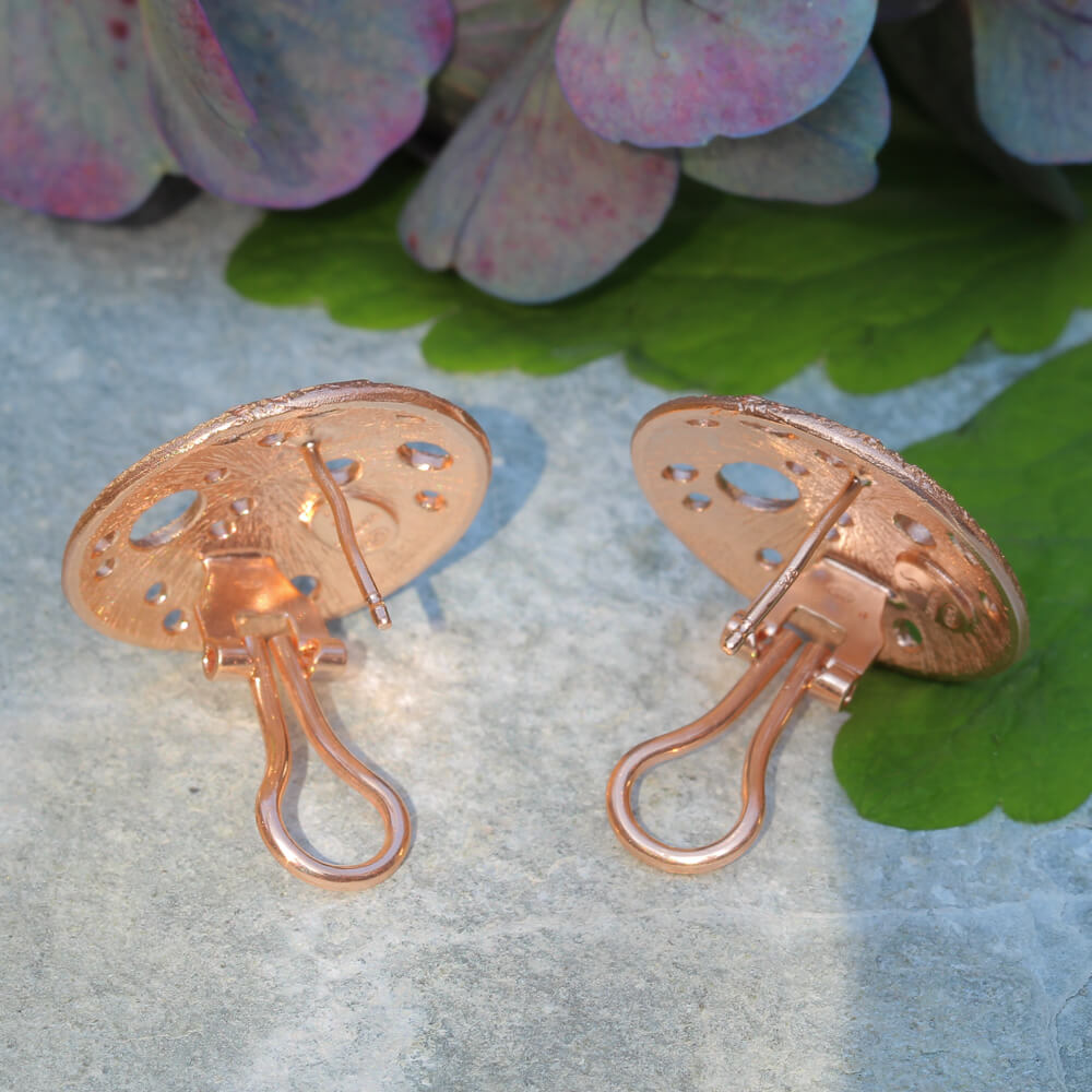 Refined rosé earrings with crafted glare