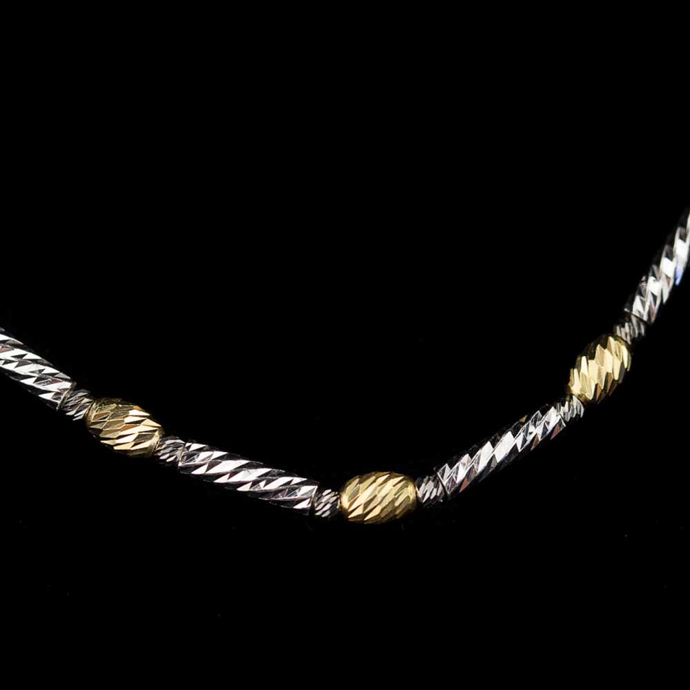 Italian three-colored bracelet in gold, black and silver