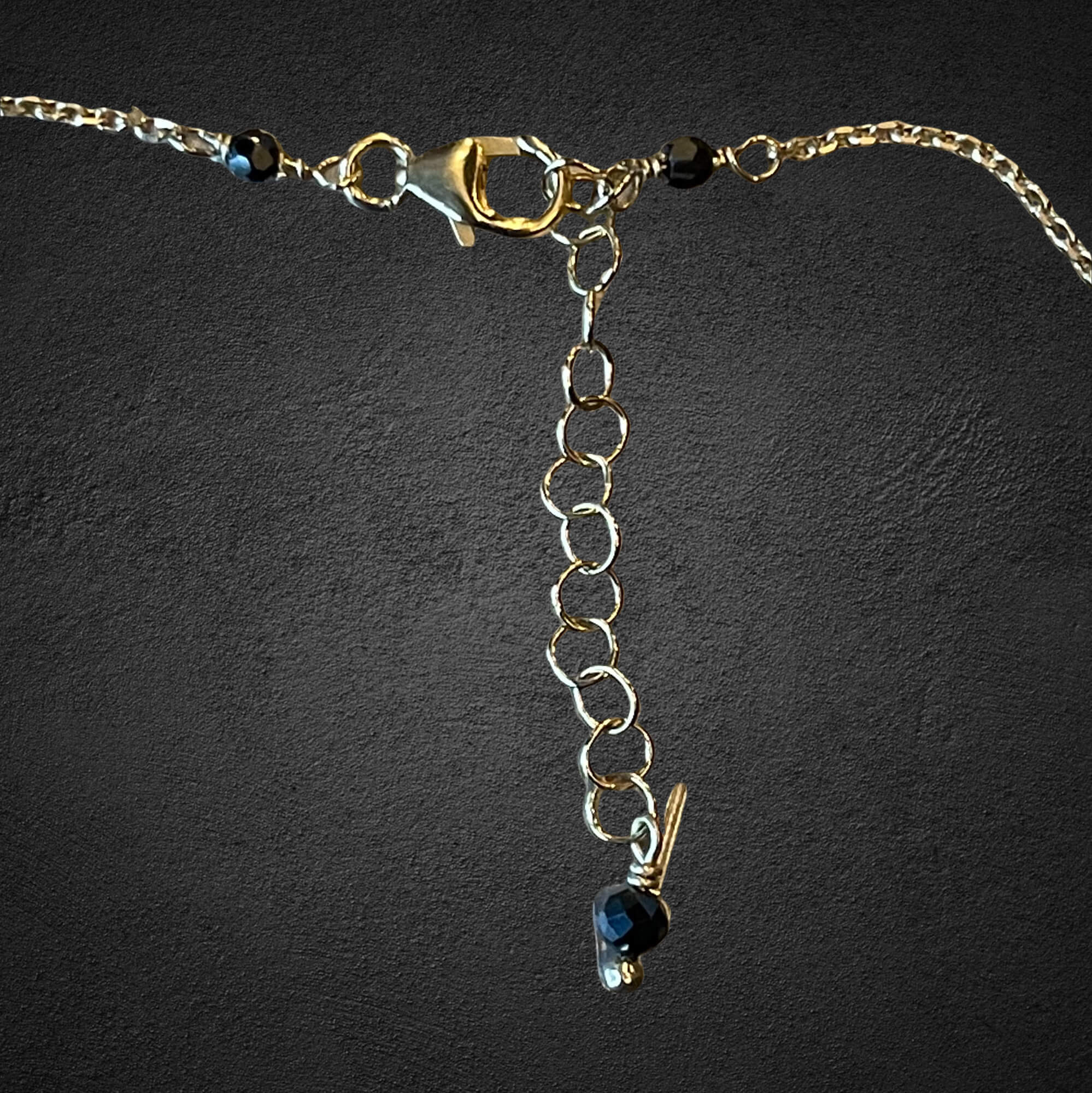 Gold-plated necklace with onyx stones