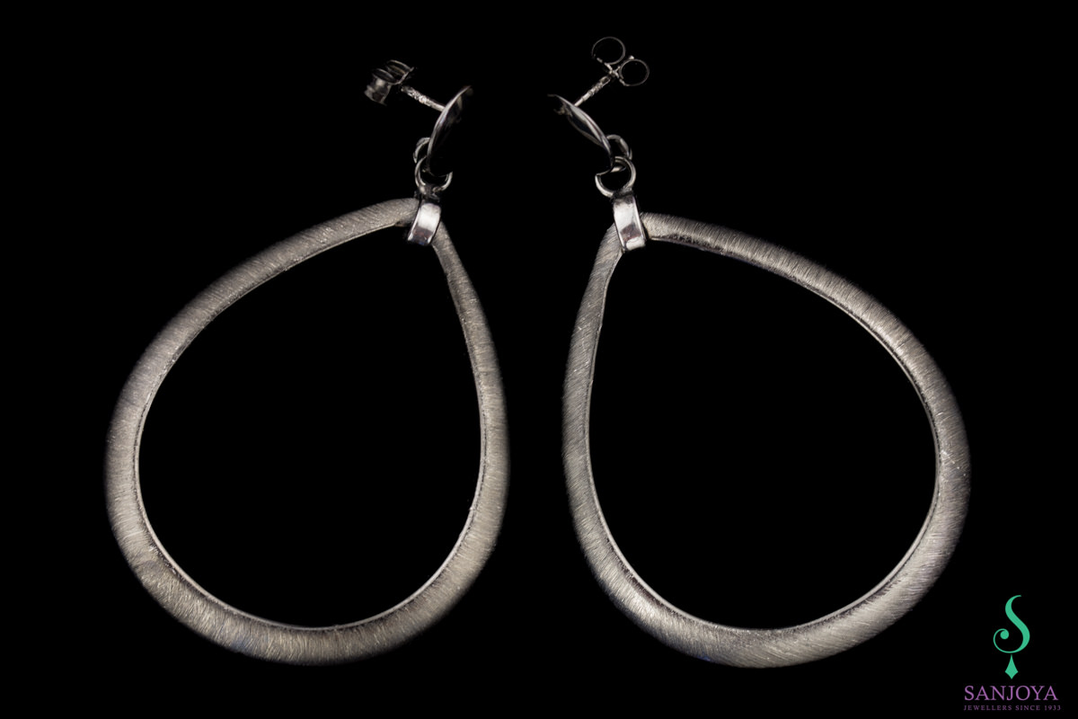Large silver black earrings in the shape of drops