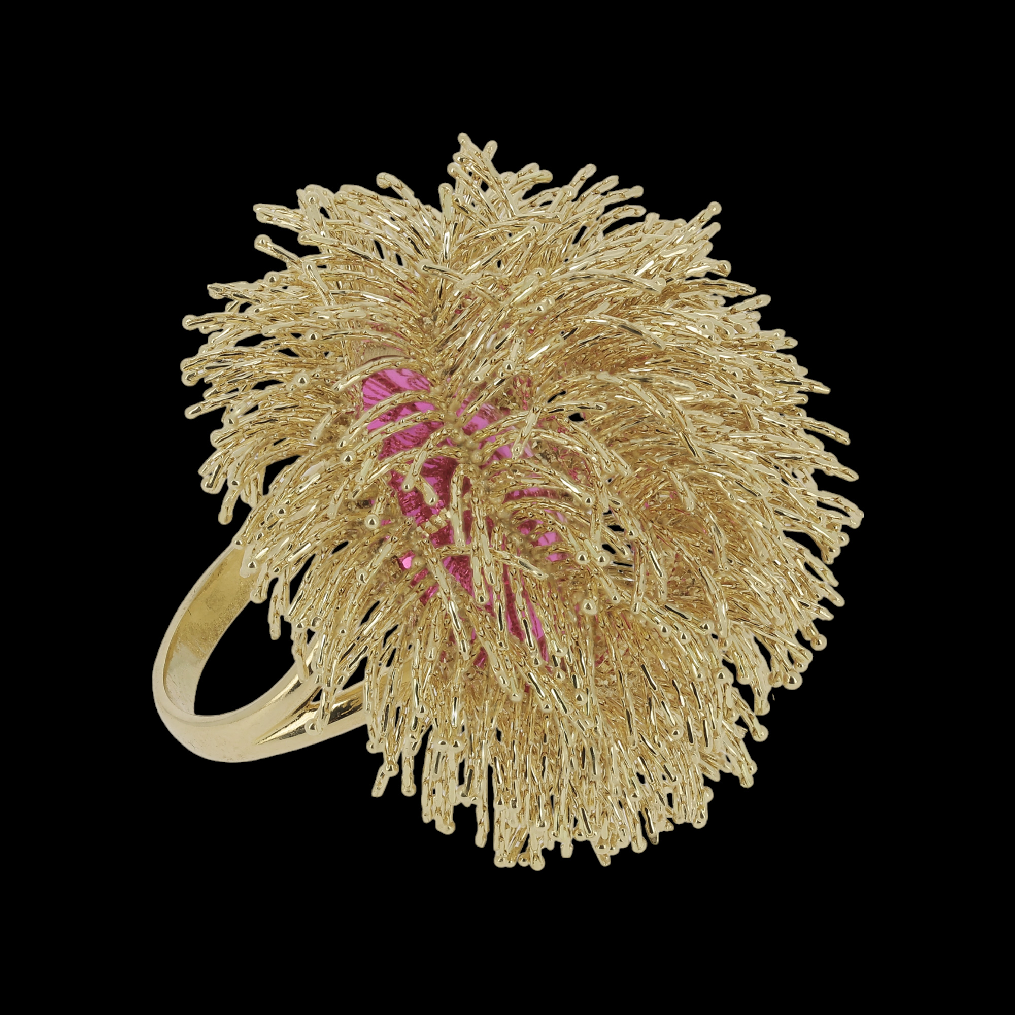 A large 18kt gold ring with fringes