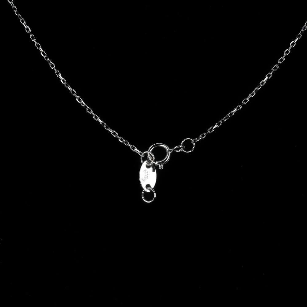 Piercing white gold necklace 18Kt with some gems