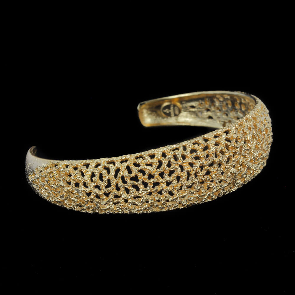 Refined narrow and gold-plated bracelet with glare