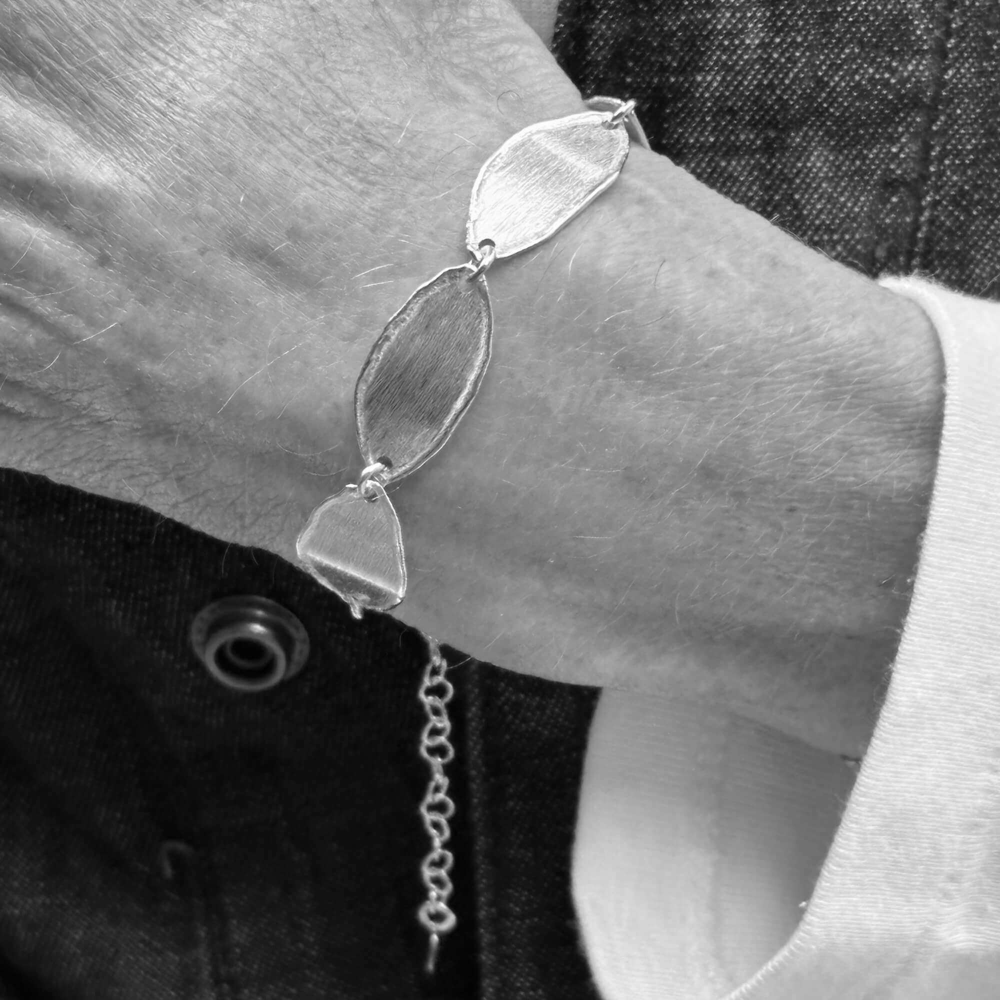 Silver and oval-shaped bracelet