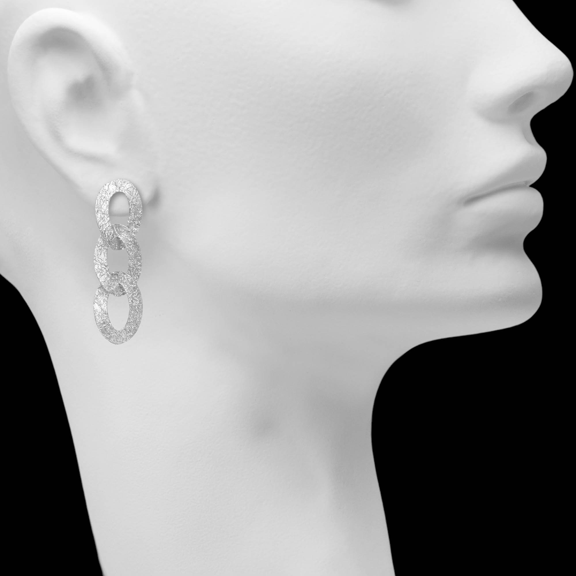 Long switching earrings in silver