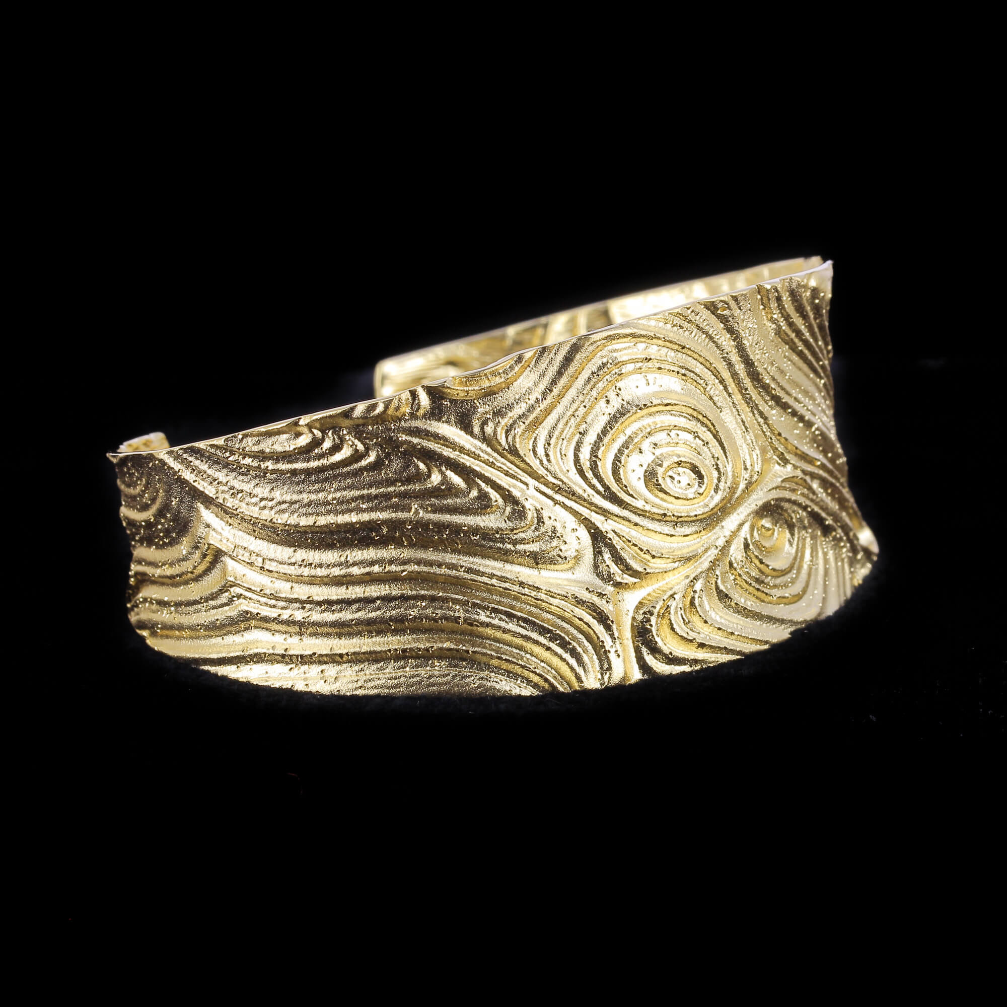 Gilt and edited wide slave bracelet