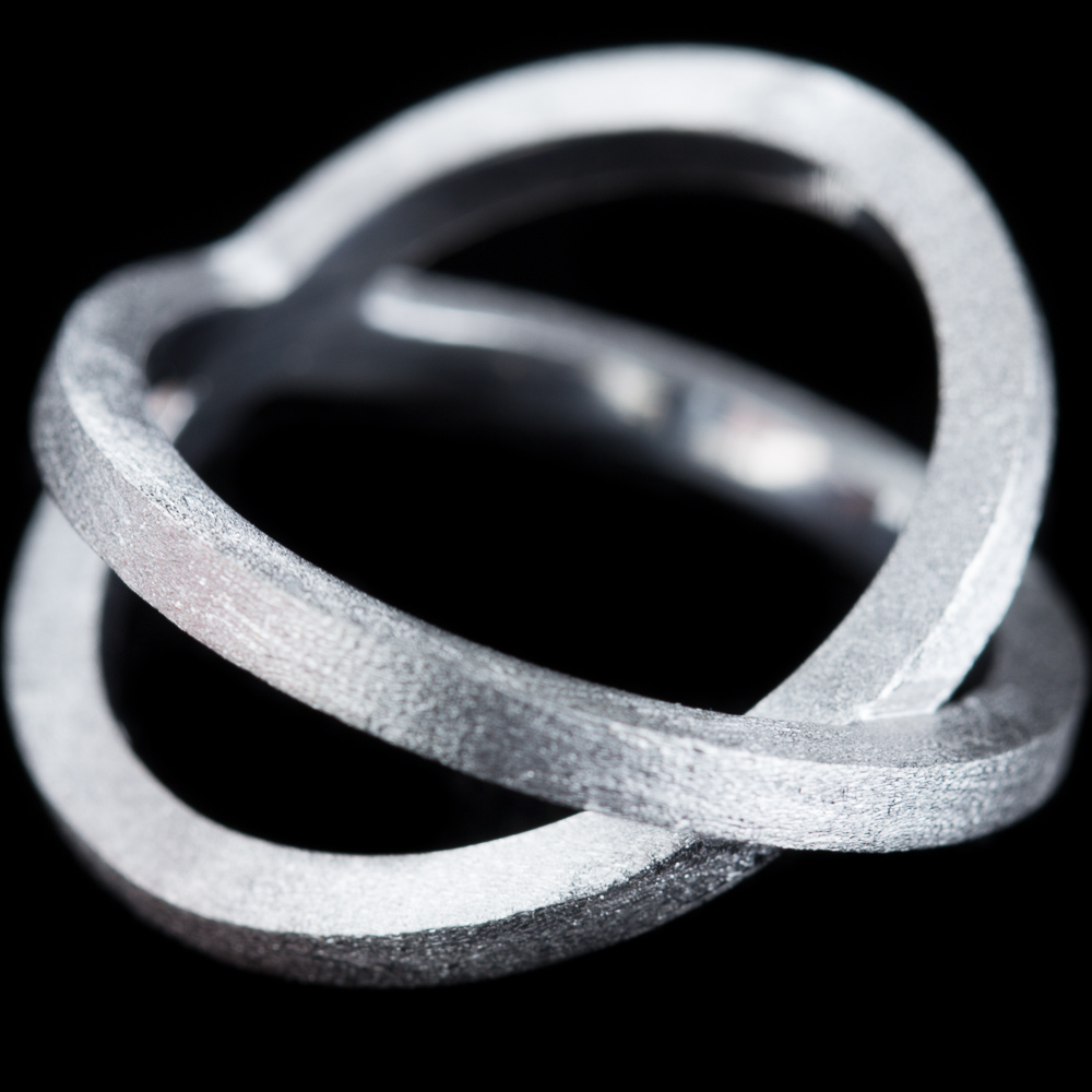 Crossed silver ring