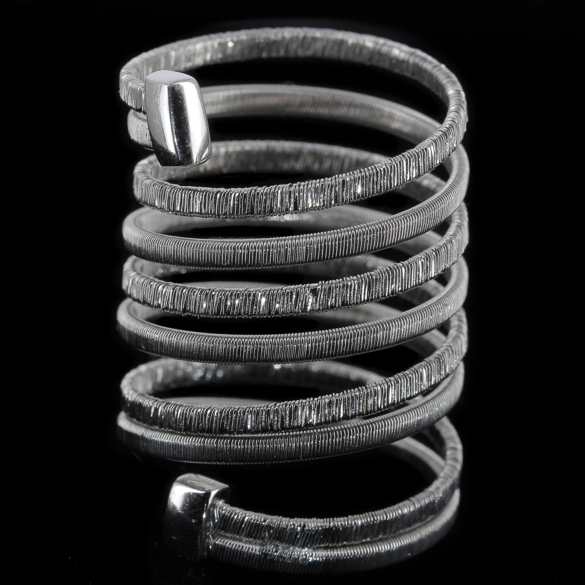 Silver and wide multi-strand ring