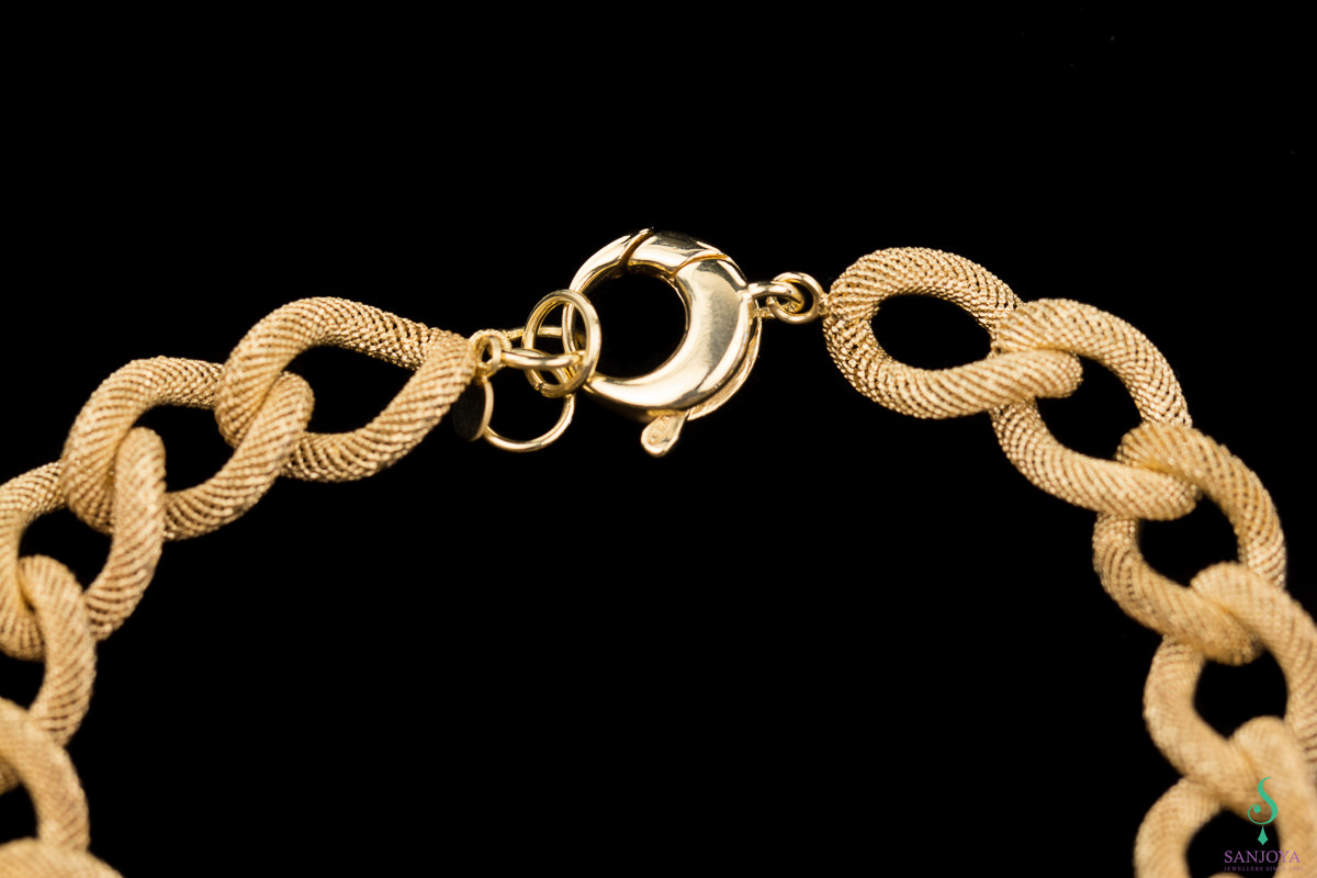Narrow gold-plated switch bracelet with beautiful transparent pattern