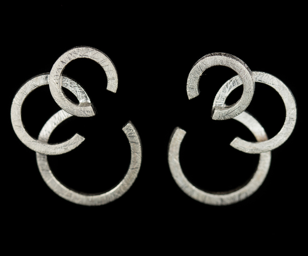 Circular silver earrings