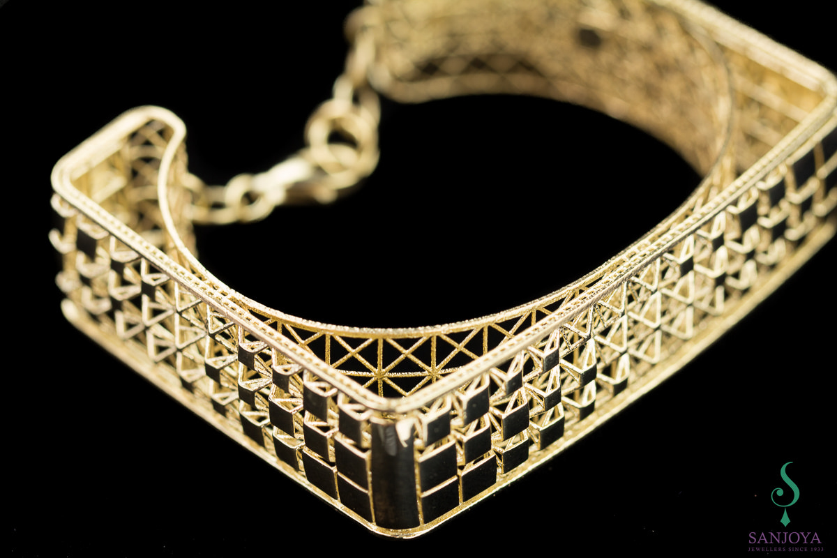 Carved and gilded square bangle