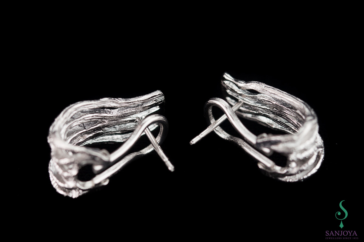 Magnifically designed diamonded silver earrings