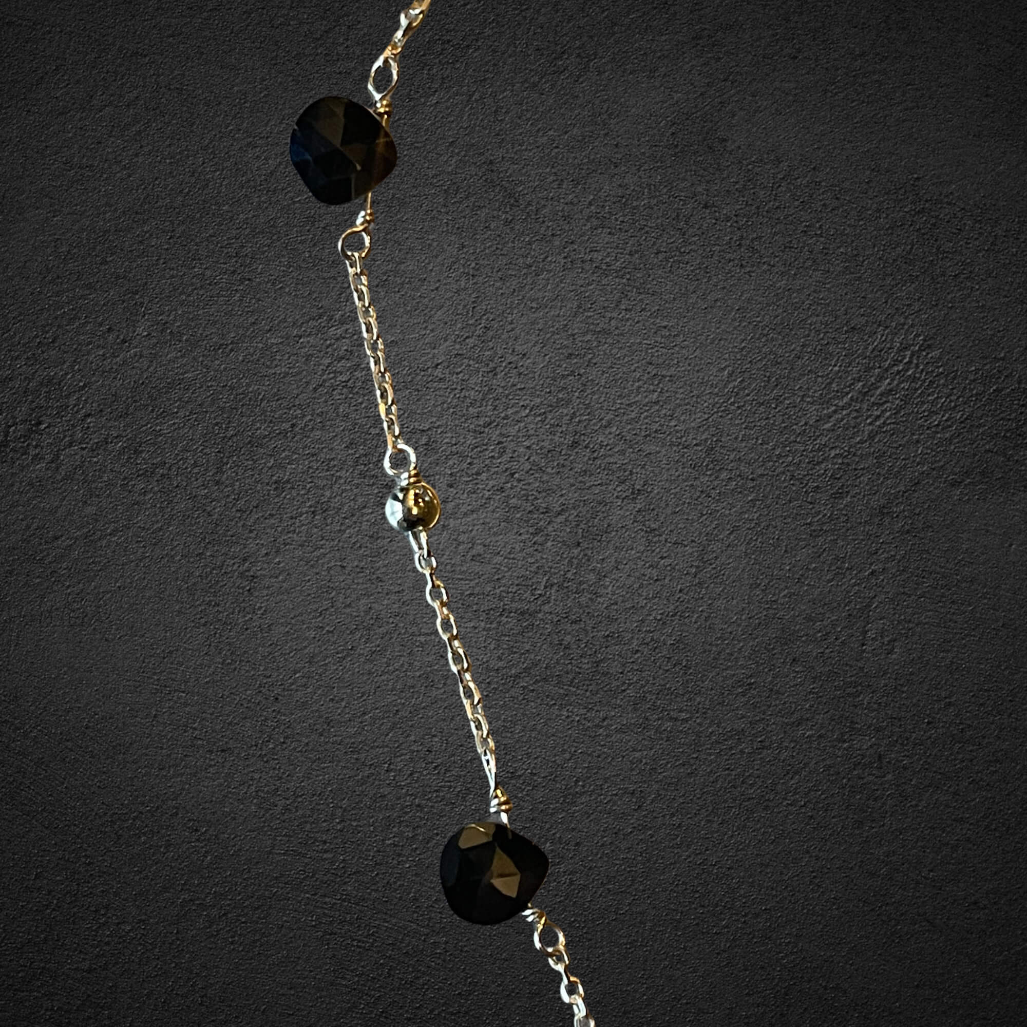 Gold-plated necklace with onyx stones