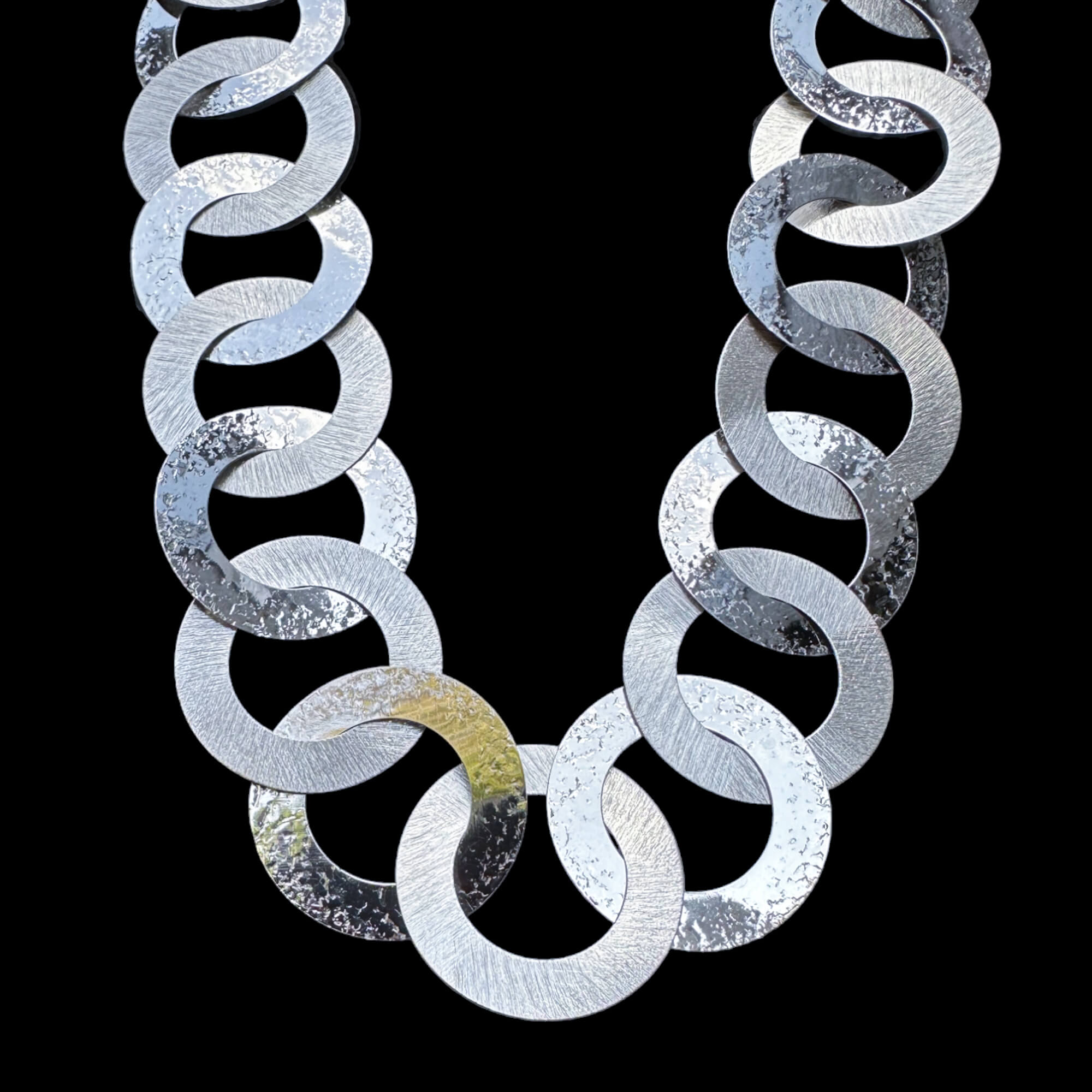 Long silver necklace with circular links