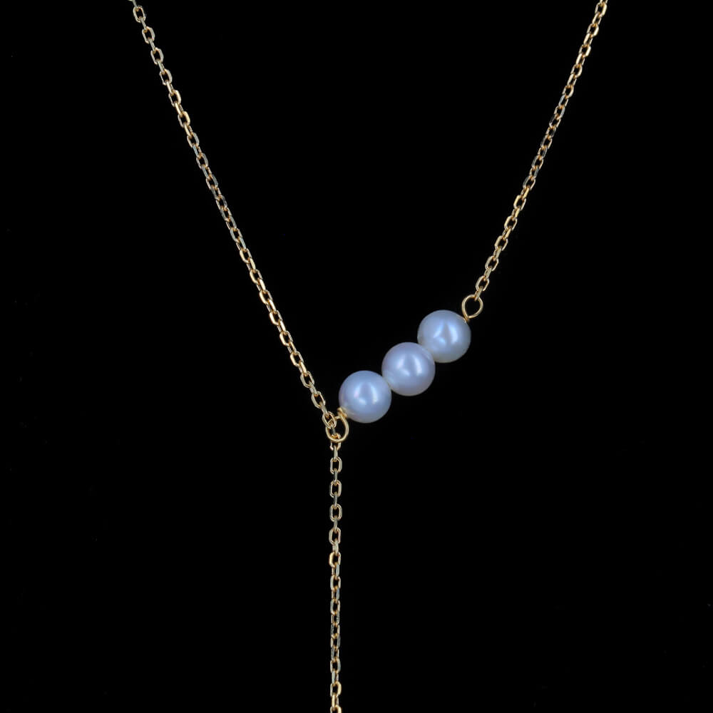 Piercing yellow gold necklace 18Kt with some gems