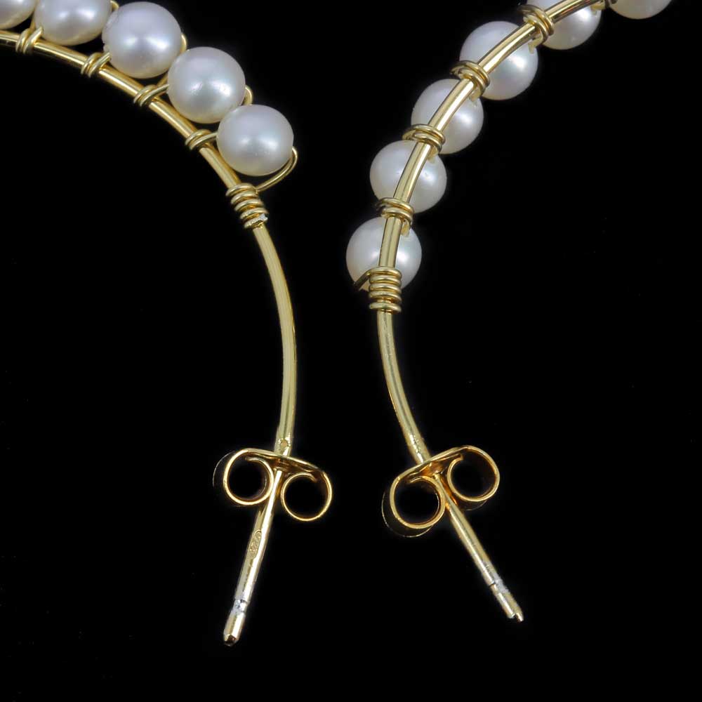 Large gold plated creoles with pearls