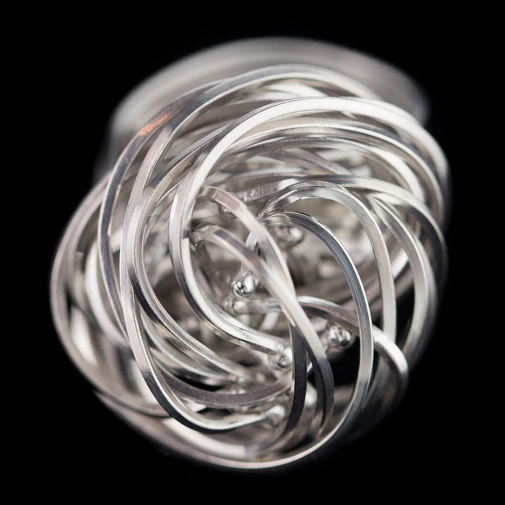 Elegant stiff multi-wire curl ring of sterling silver