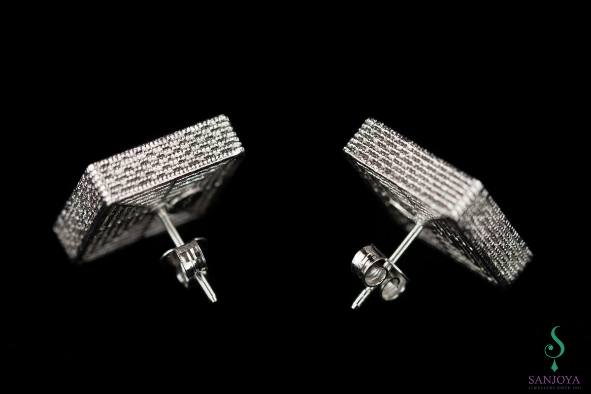 Square-shaped earrings. silver and edited