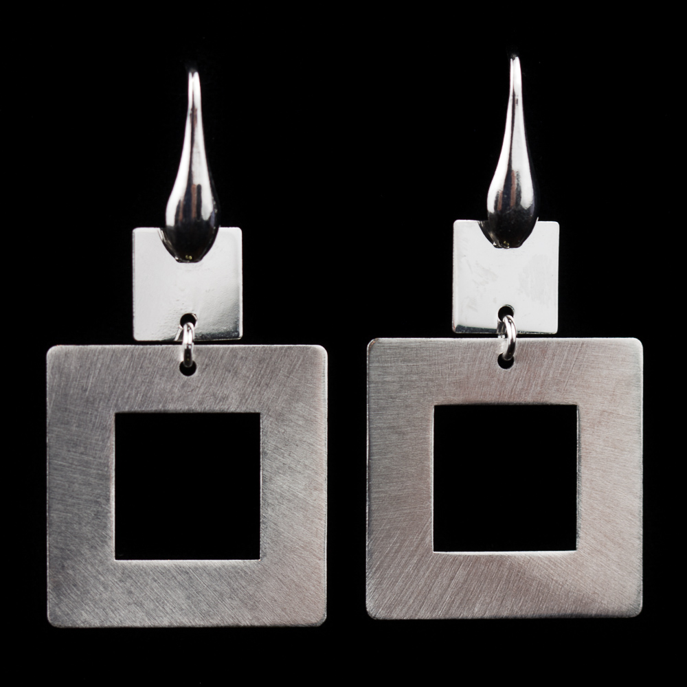 Silver earrings. drooping and square