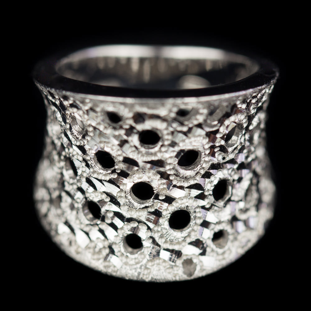 Silver ring with open circles