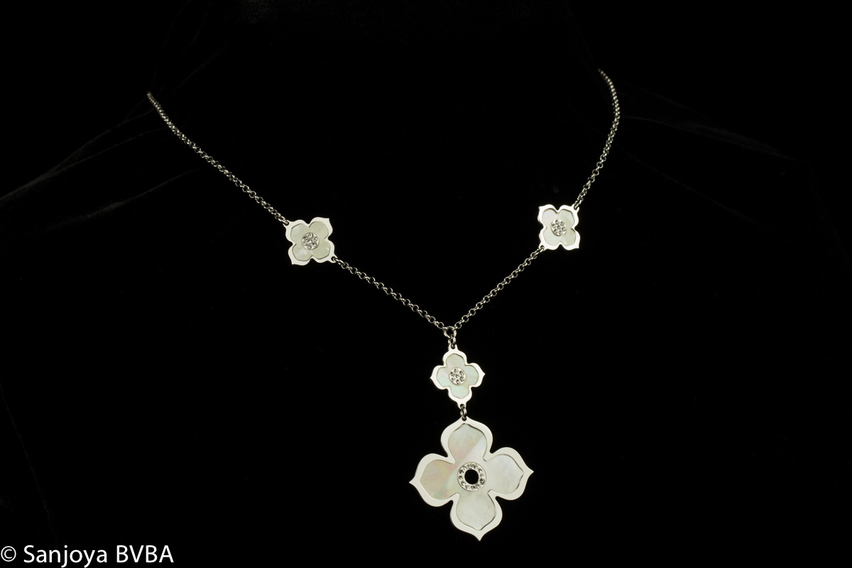 Silver necklace with flowers and decorated pendant