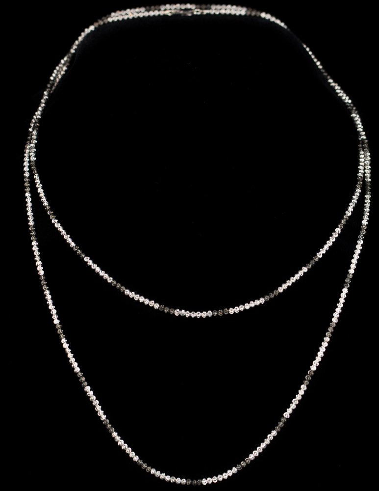 Necklace of silver and black; in various lengths