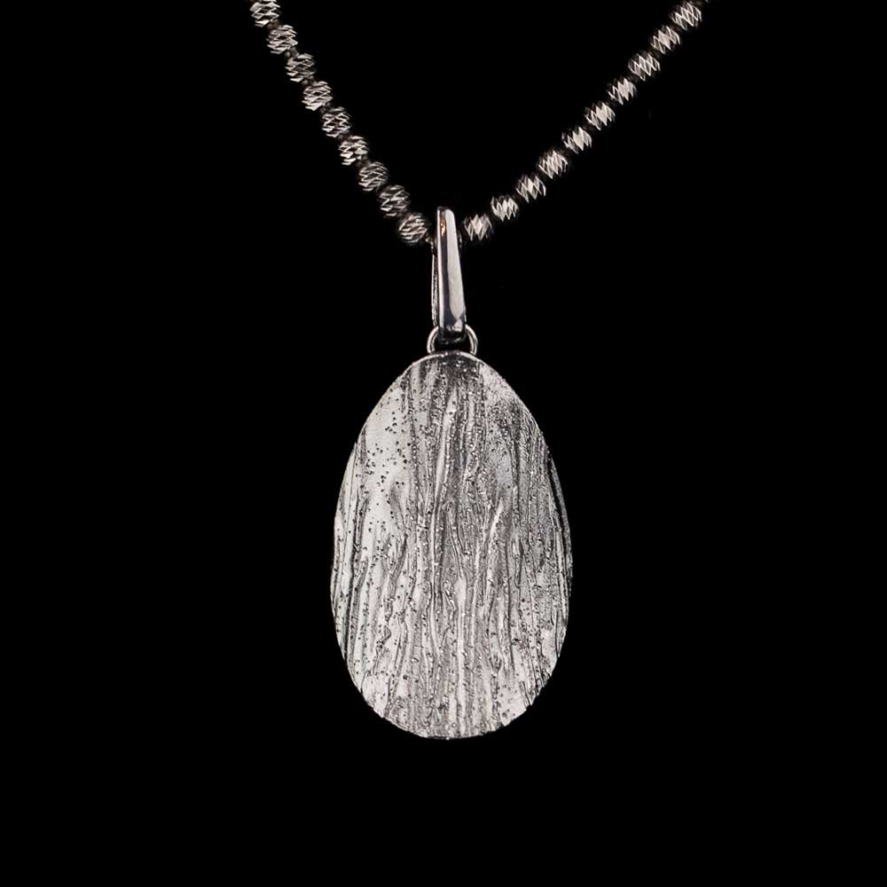 Oval gray silver pendant with diamond cut and necklace