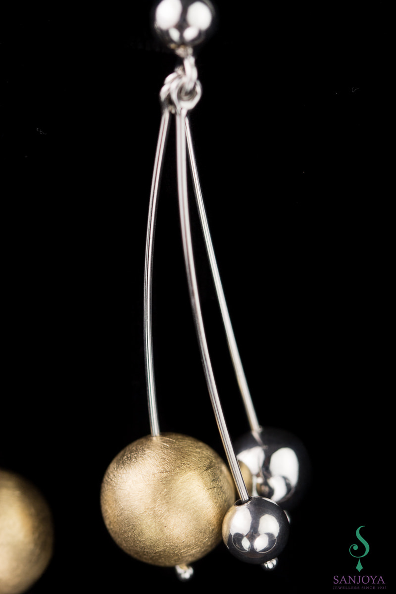 Two-tone silver long earrings with decorations
