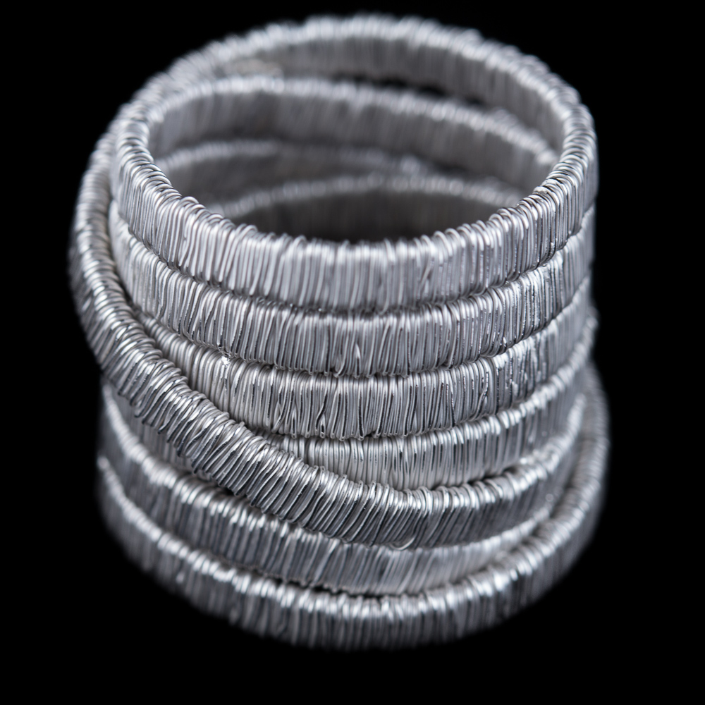 Special interwoven ring from sterling silver with five rows of matt silver. Available in sizes 50, 52, 54, 56, 58, 60 and 62. Please do your call if the desired size is not in stock