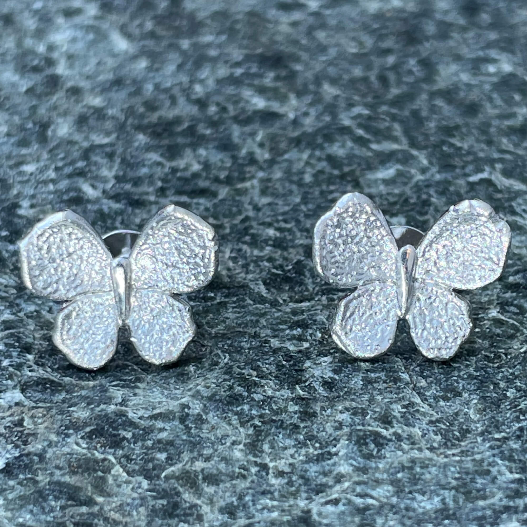 Silver mini butterfly earrings