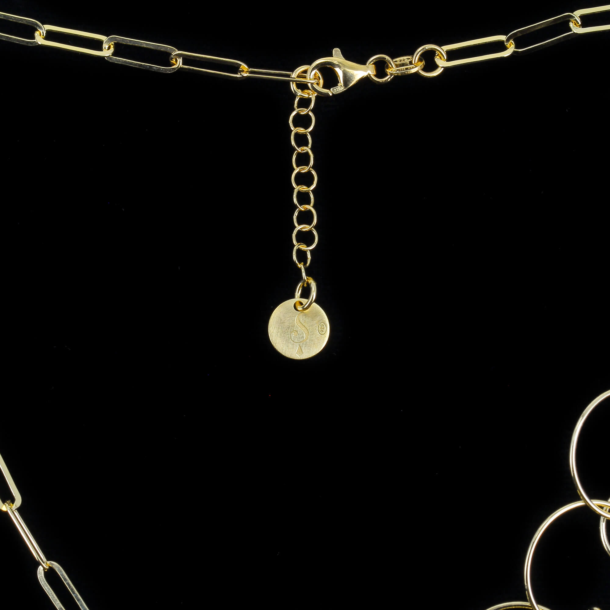 Open en gesloten ronde vergulde schakelketting met sliert