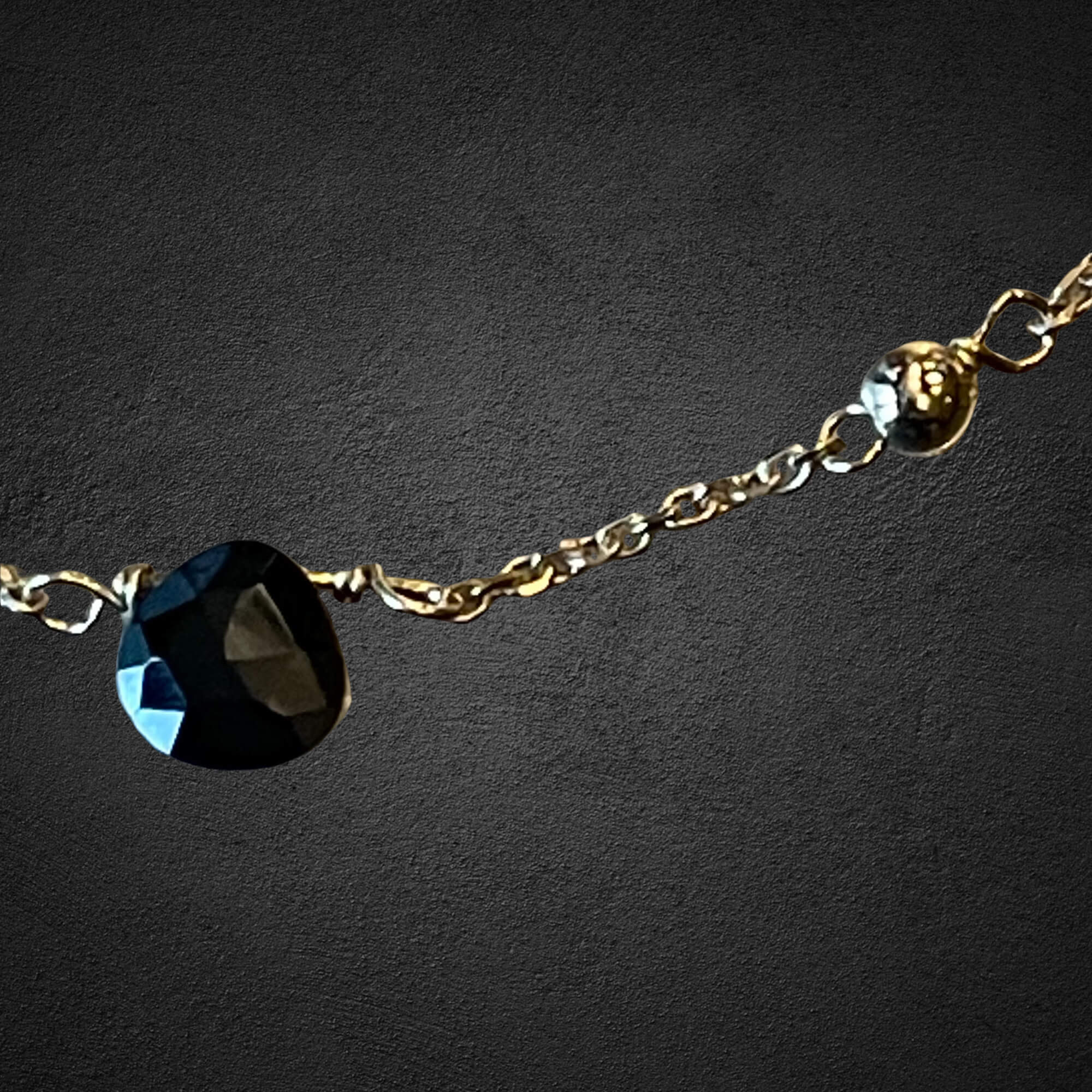 Gold-plated necklace with onyx stones