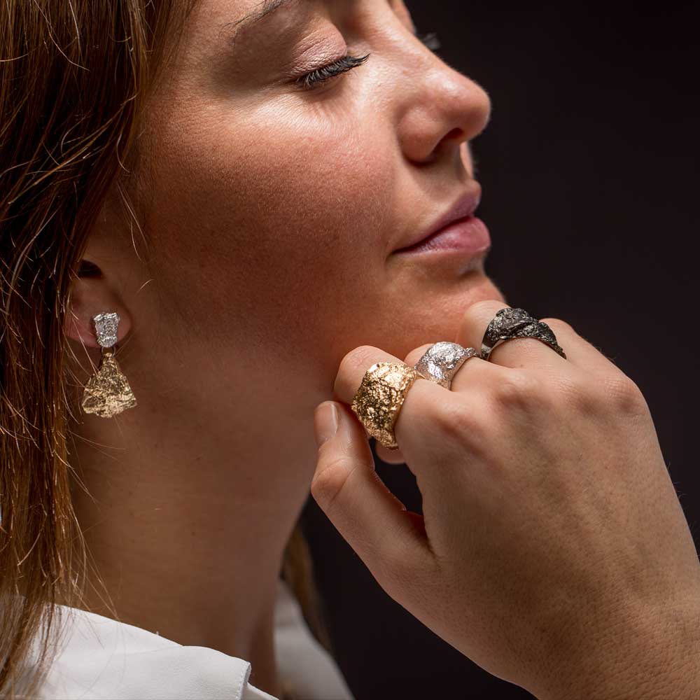 Silver and gold stone-shaped two-tone earrings