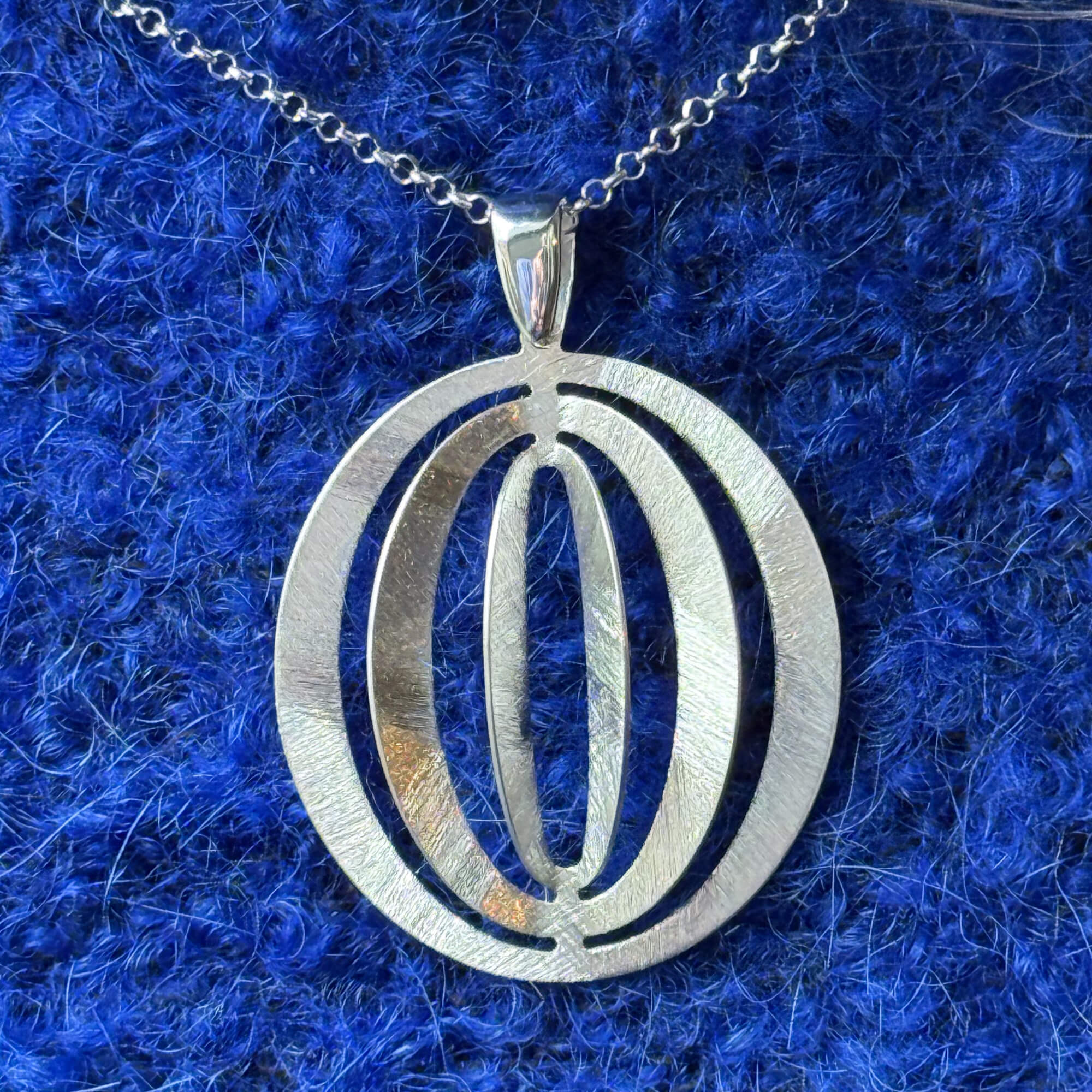 Silver Necklace with an Openwork Pendant