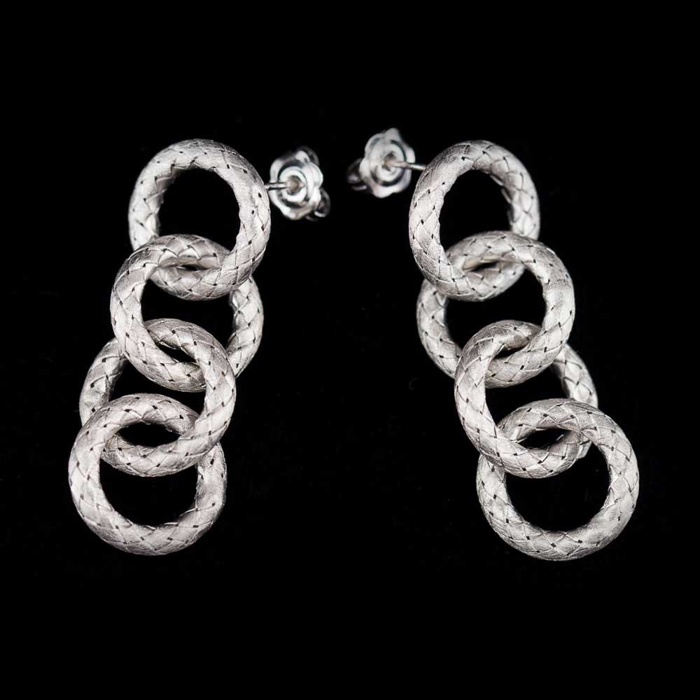 Silver earrings of open and round links