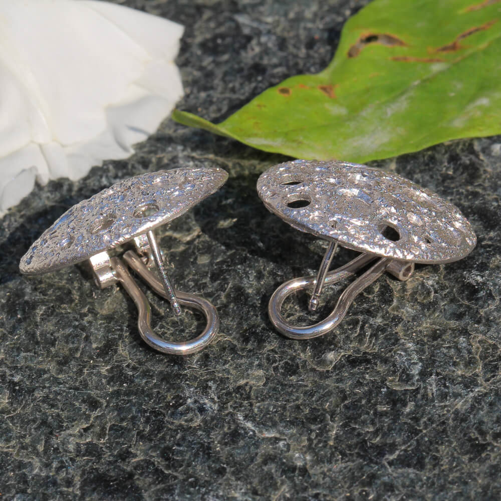 Refined silver earrings with crafted glare