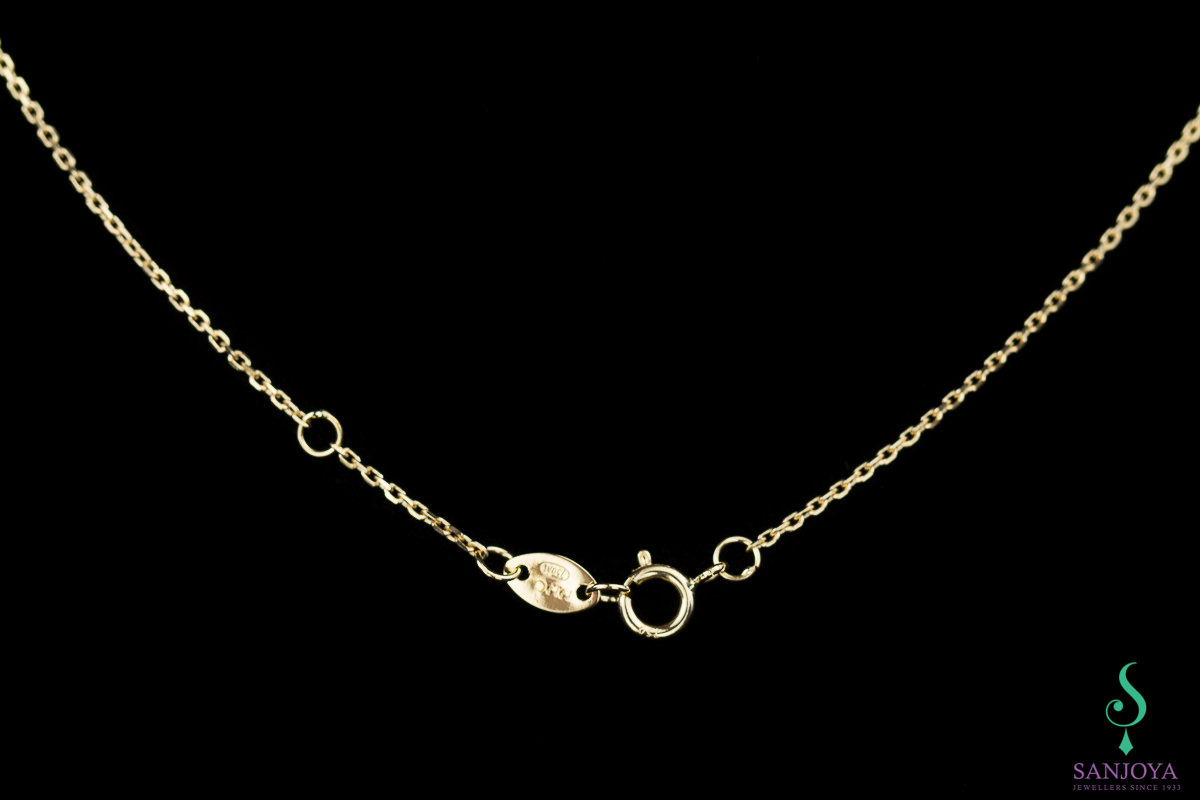 Gold chain with two circles as a pendant; 18 kt