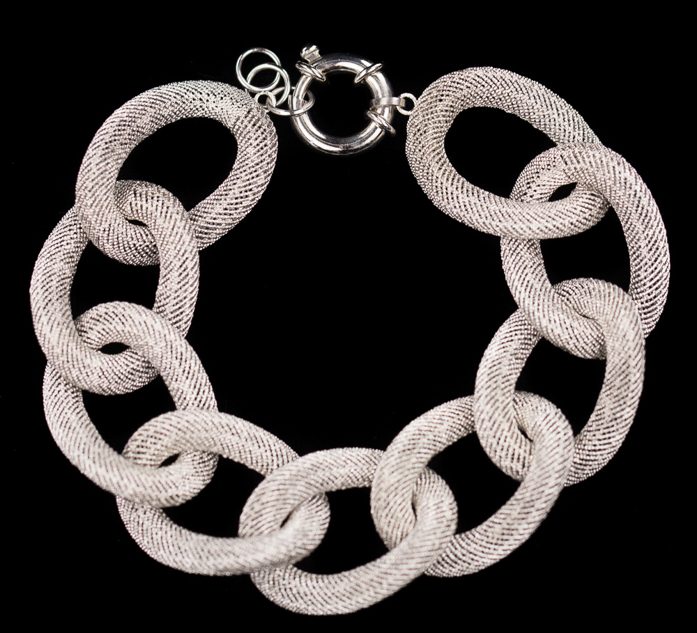 Wide silver link bracelet with beautiful transparent pattern