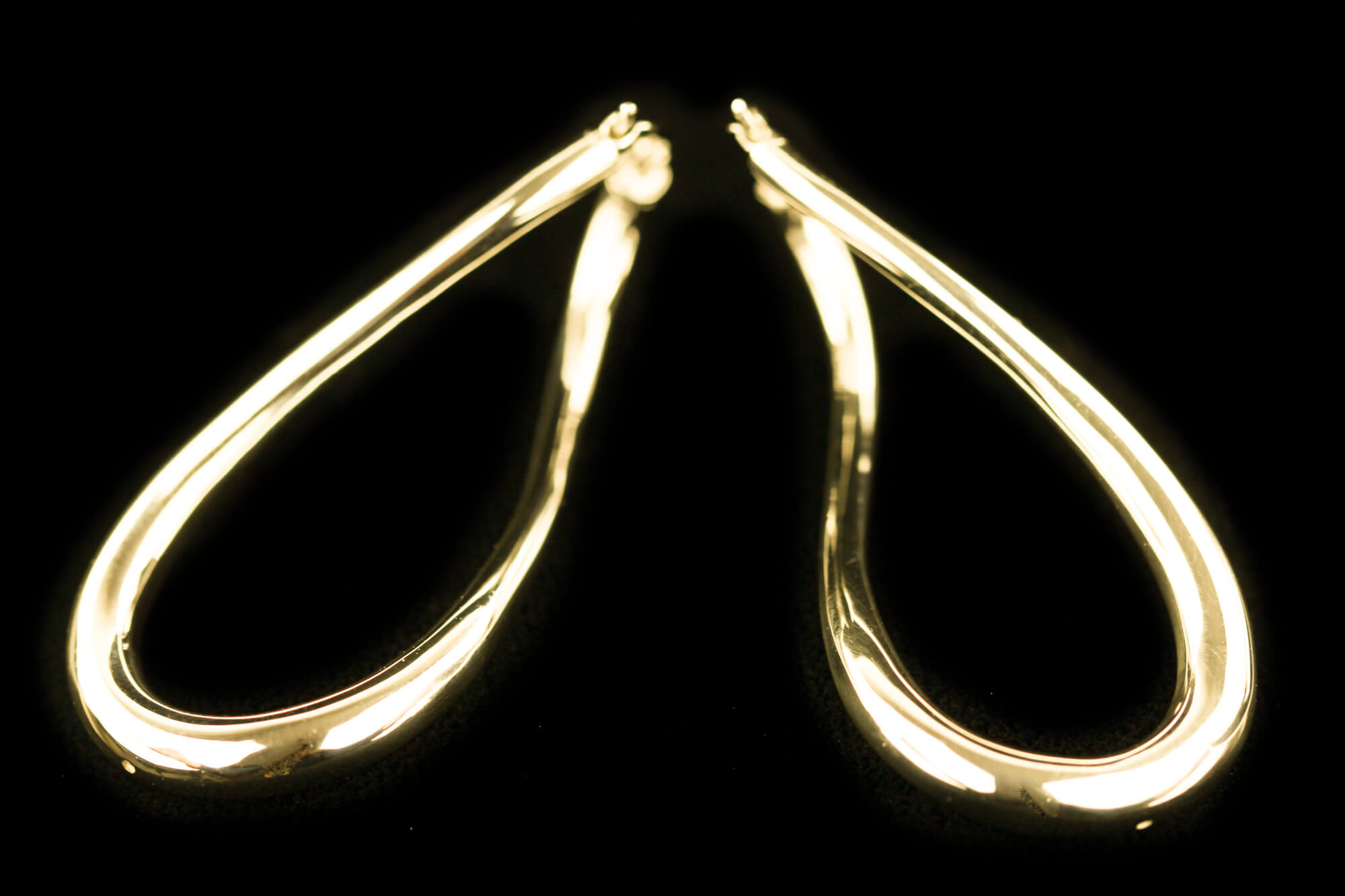 Gold-plated and polished infinity créolen