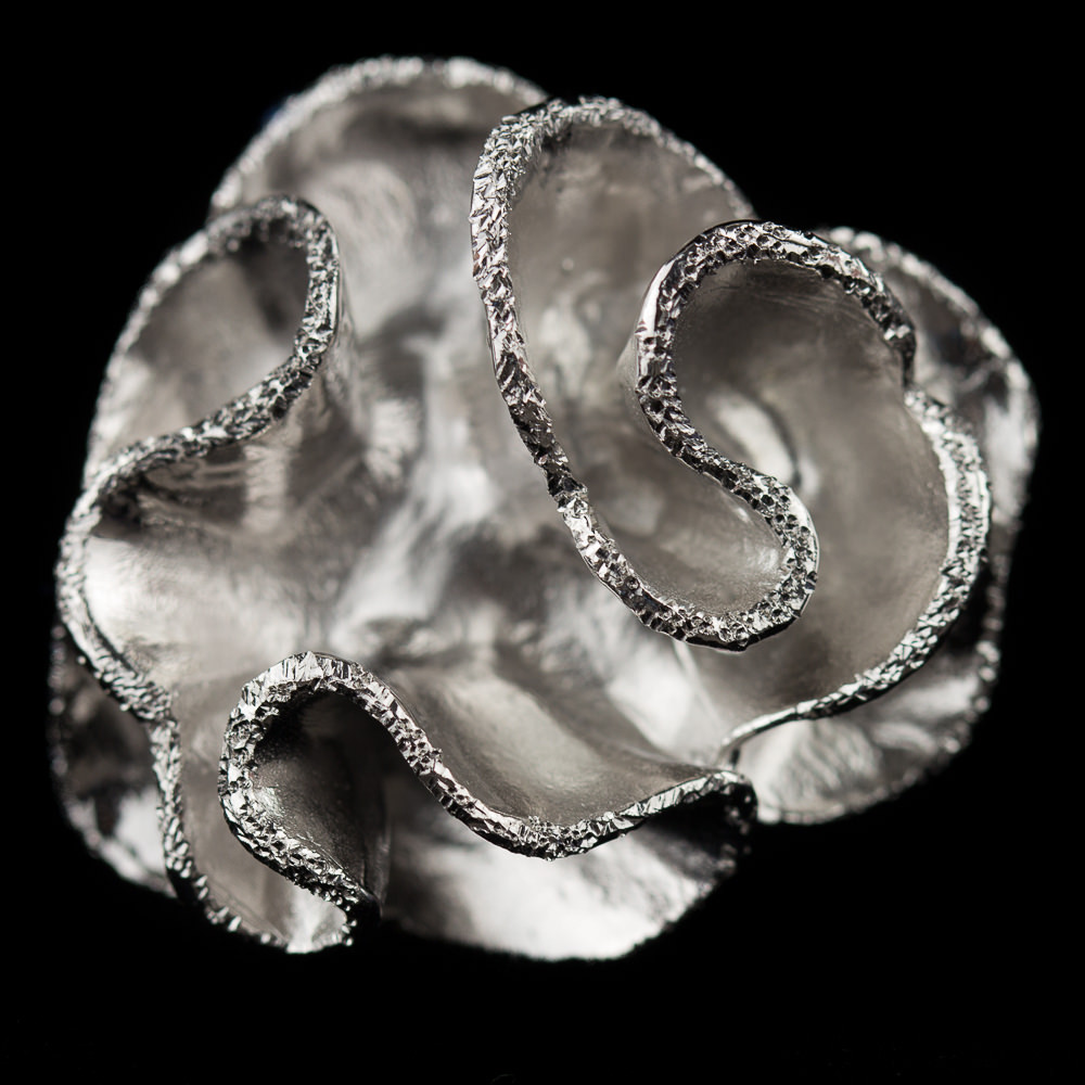 Large silver flower ring; curly and diamonds