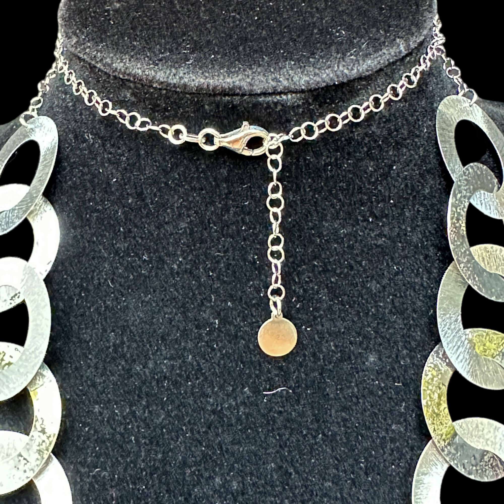 Long silver necklace with circular links