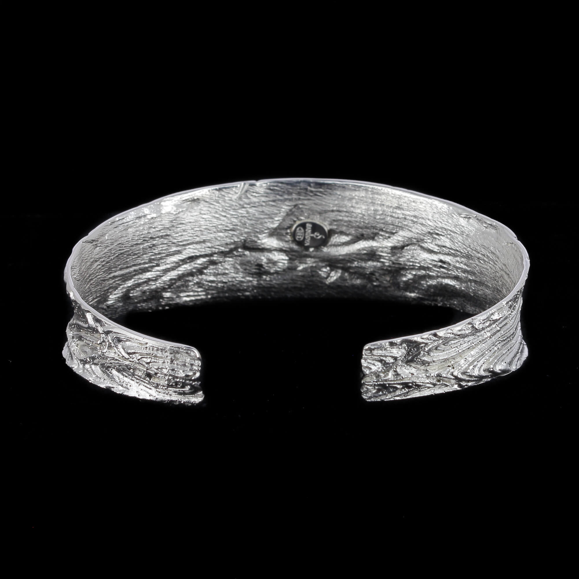 Silver and narrow processed slave bracelet